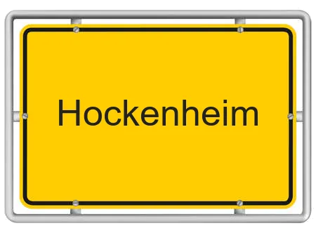 Gelbes Ortsschild mit der Aufschrift Hockenheim